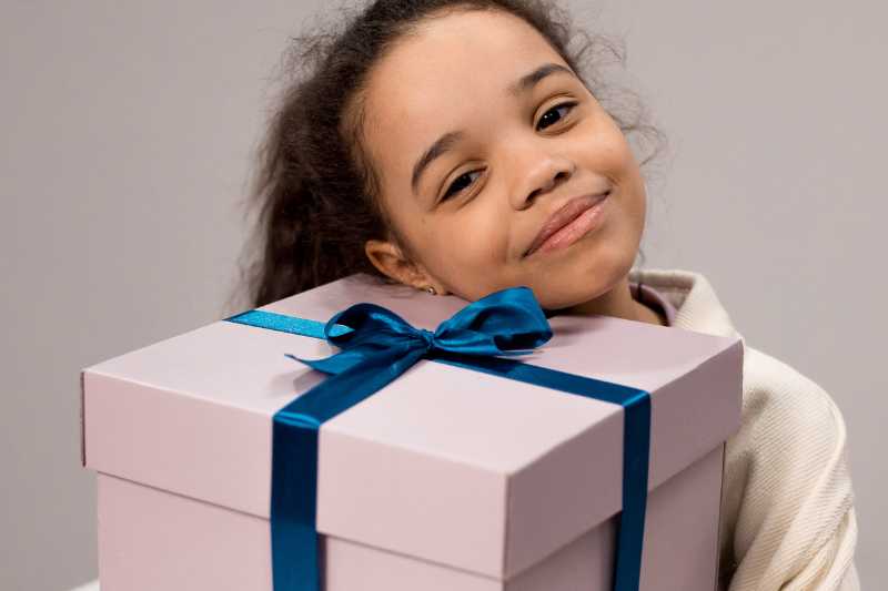 putting toothpaste on toothbrush